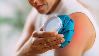 Warmth applied to the frozen shoulder can help with pain
